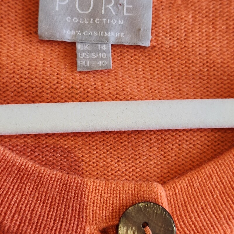 Pure Color Cashmere Tangerine Button Down Cardigan Size 8/10 US - 14 UK - EU 40<br />
Pit to Pit 19 inches across<br />
Pit down Sleeve 17.5 inches<br />
Waist 18.5 inches across<br />
down the back 23.5 inches<br />
EUC<br />
Retail $600
