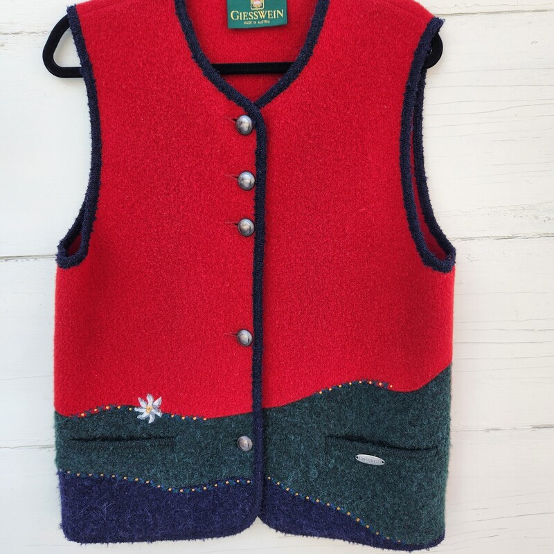 Vintage Giesswein Wool Vest  size L/XL<br />
Red, green and Navy Wool with embroidered flower<br />
Pit to Pit 20.5 inches across<br />
Sleeve opening 10.5 inches<br />
Waist 20.5 inches across<br />
Hip 21 inches across<br />
Down the back 26 inches<br />
EUC